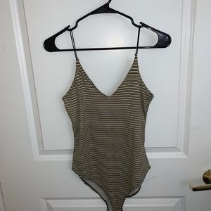 Yellow black and white bodysuit